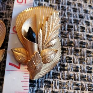 Costume clip on earrings gold black